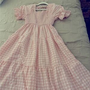 Sundress, pink and white with puff sleeves.